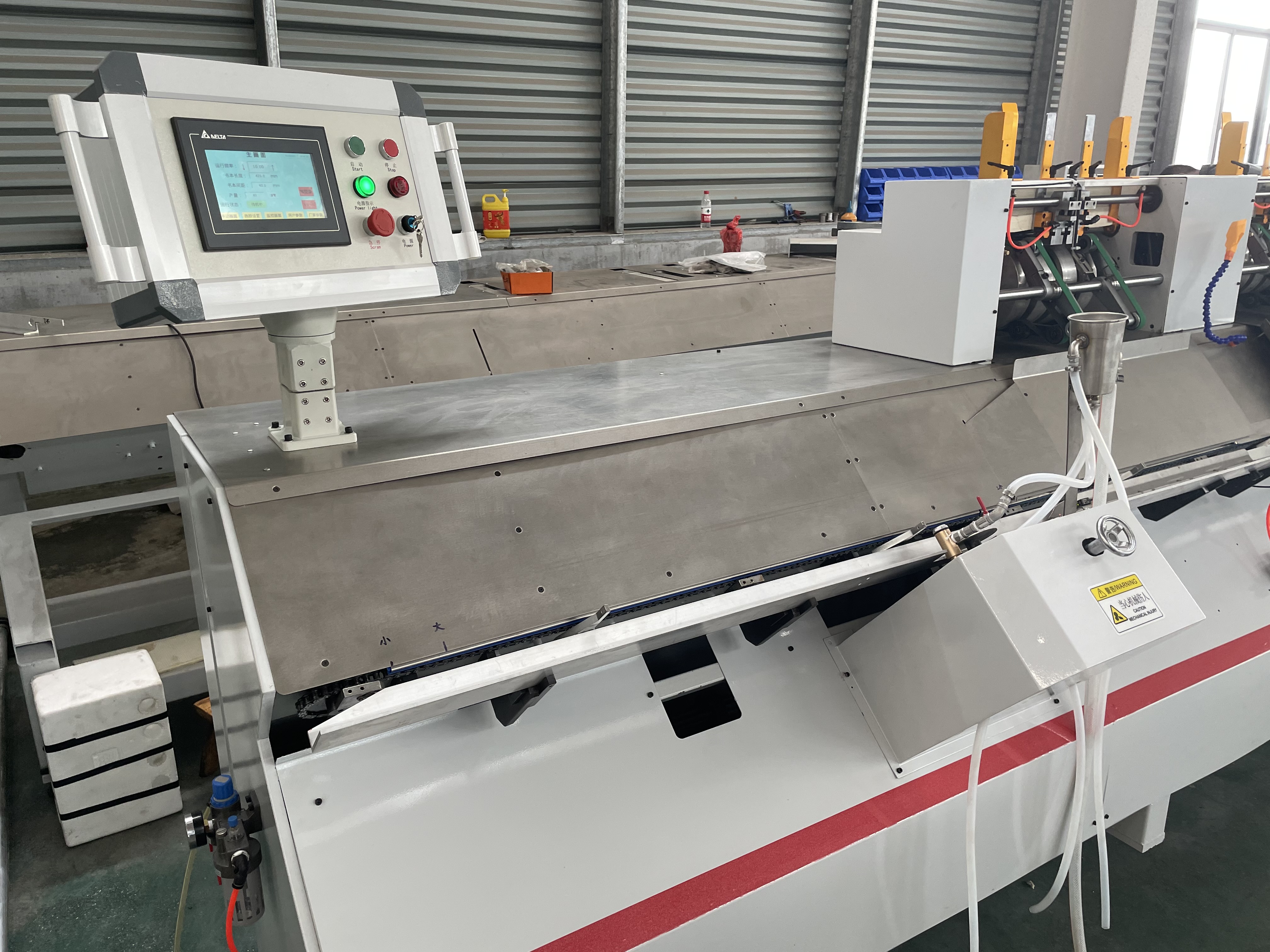 Automated End Papering Setup in a Bindery